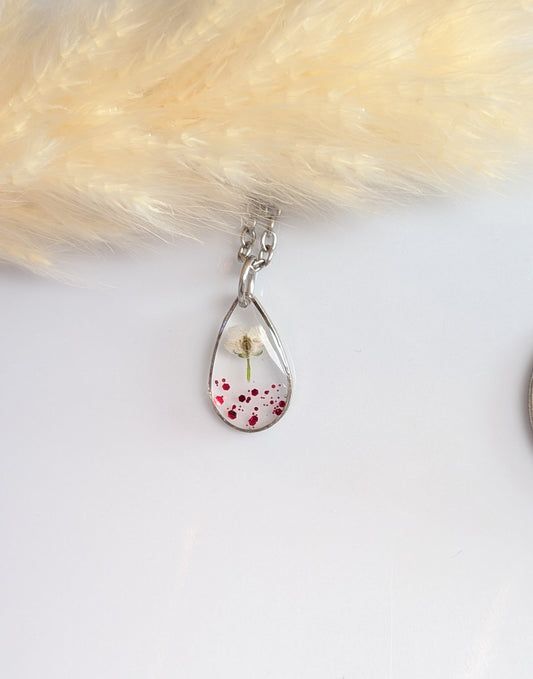 Red glitter, white floral teardrop